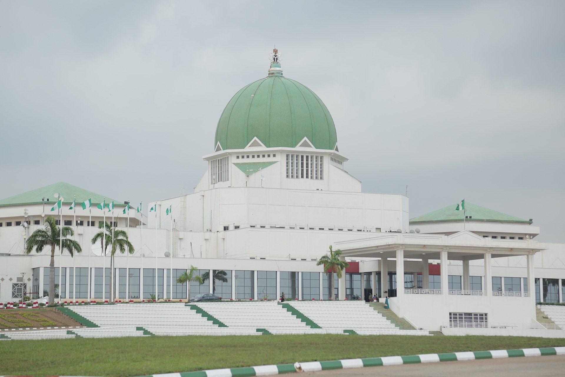 Nigeria's National Assembly chambers as a report highlights unmet legislative commitments by lawmakers.