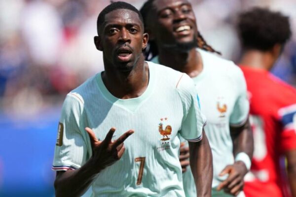 Ousmane Dembele celebrates after scoring a hat-trick during France's World Cup victory over Norway.