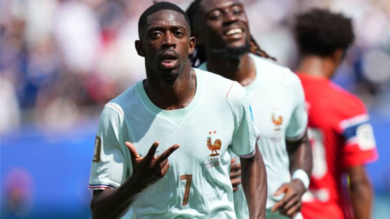 Ousmane Dembele celebrates after scoring a hat-trick during France's World Cup victory over Norway.