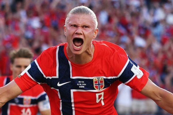 Erling Haaland celebrates after scoring twice during Norway's 4-1 World Cup victory over Iraq.