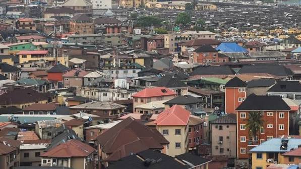Overcrowded housing in Lagos Nigeria showing the severe affordable housing deficit and rent crisis facing low-income workers in 2026