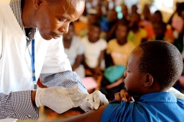 Healthcare workers attending to patients at a Nigerian primary healthcare centre amid nationwide staffing shortages.