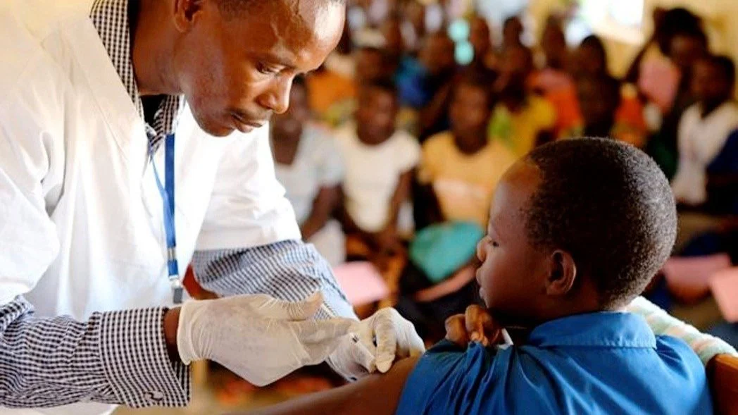 Healthcare workers attending to patients at a Nigerian primary healthcare centre amid nationwide staffing shortages.