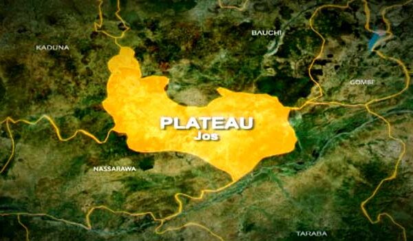 Security personnel patrol a community in Plateau State following a deadly attack that killed 18 residents.