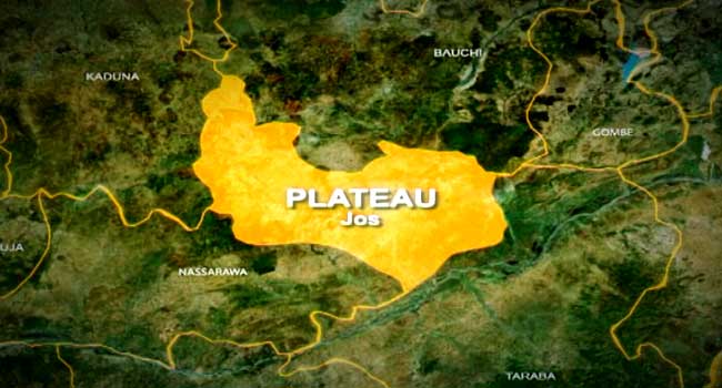 Security personnel patrol a community in Plateau State following a deadly attack that killed 18 residents.