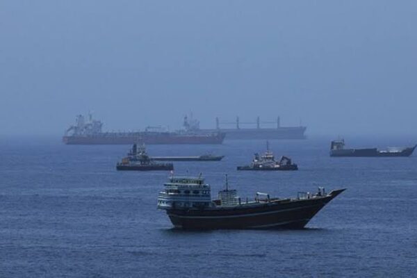 Commercial vessels anchored in the Strait of Hormuz as the United Nations calls for the evacuation of stranded seafarers.