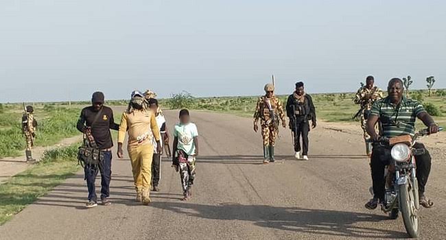 Operation Hadin Kai troops after the surrender of a senior ISWAP finance operative in Borno State.
