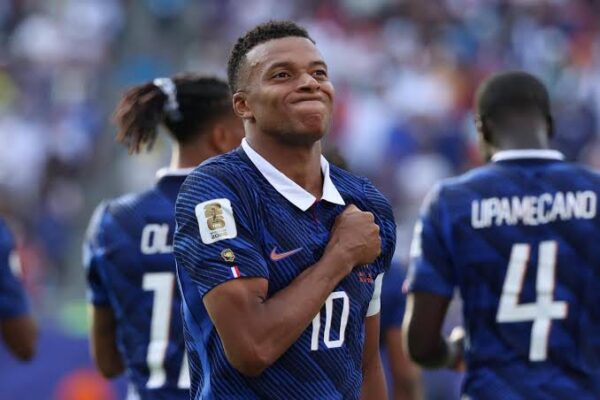 Kylian Mbappe celebrates after scoring for France to extend his Mbappe World Cup goals record against Sweden.
