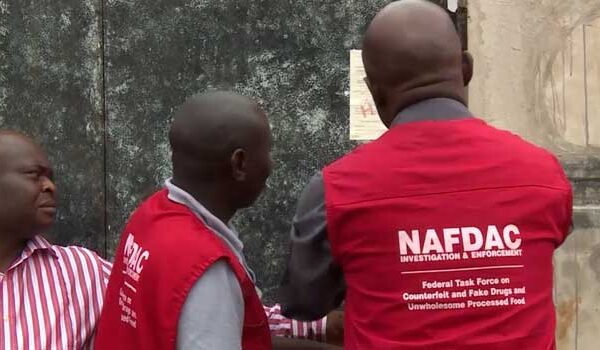 NAFDAC officials sealing an alcohol manufacturing factory in Ogun State during enforcement of the sachet alcohol ban.