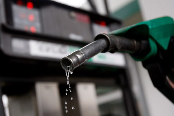 Fuel pumps at a Nigerian filling station as rising global crude oil prices delay expected reductions in petrol prices.