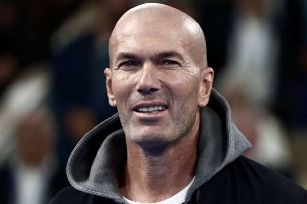 Zinedine Zidane reacts during a football event amid reports he has signed to become France's head coach until 2030.