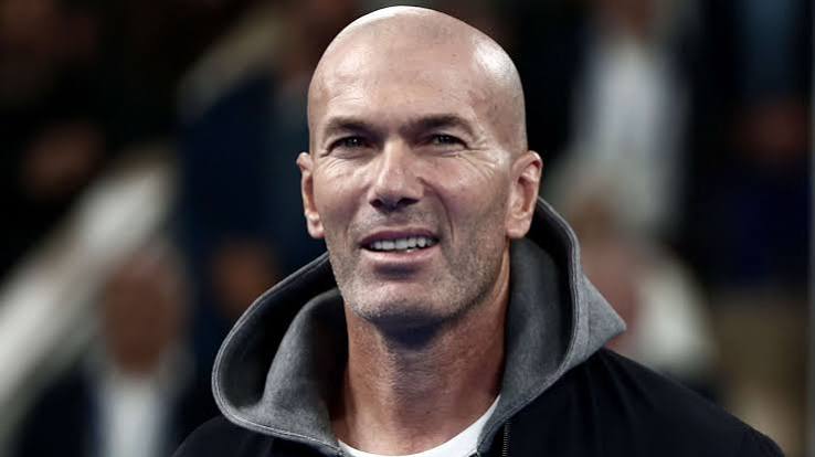 Zinedine Zidane reacts during a football event amid reports he has signed to become France's head coach until 2030.