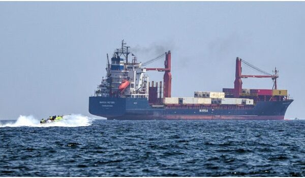 Oil tanker transits the Strait of Hormuz as Iran says reopening the strategic waterway depends on the United States ending its naval blockade.