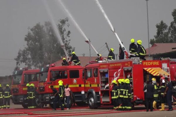 Firefighters battle a petrol tanker blaze at AYM Shafa filling station in Area 3 Garki Abuja.