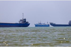 Commercial cargo vessel transiting the Strait of Hormuz amid heightened regional tensions.
