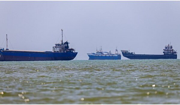 Commercial cargo vessel transiting the Strait of Hormuz amid heightened regional tensions.