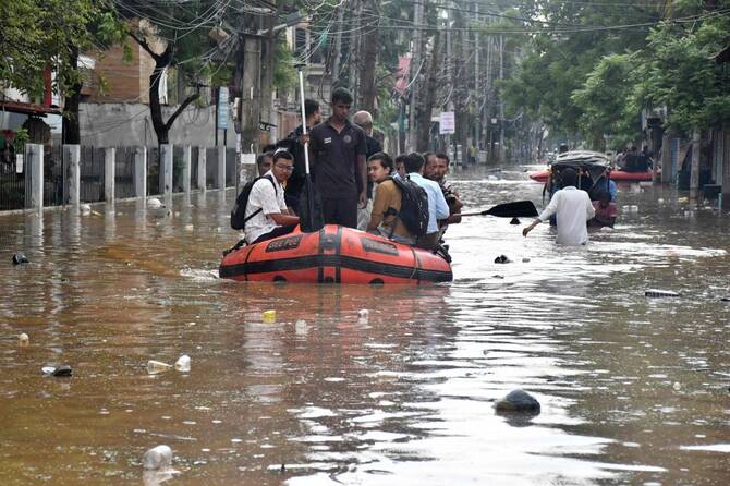 Flooded communities in India following heavy monsoon rains that triggered deadly floods and landslides.