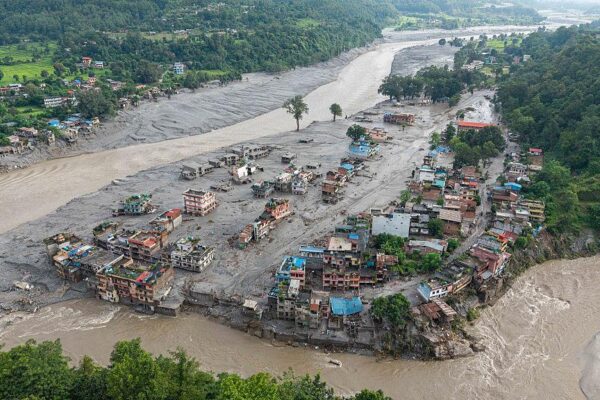 Flood destruction in Nepal as rescue teams search for thousands missing after devastating Himalayan floods