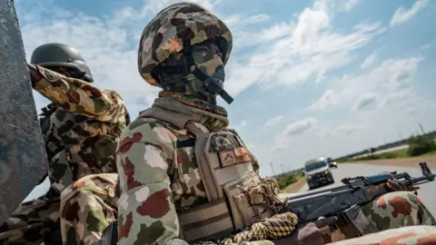 Security forces and military vehicles deployed for rescue operations after mass abduction in Borgu, Niger State