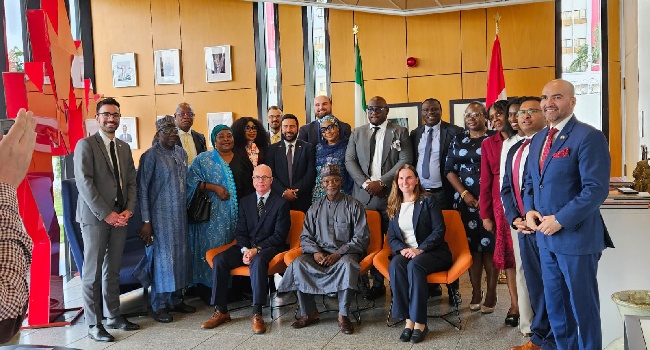 Nigerian and Canadian officials sign the expanded air transport agreement to enable direct flights between both countries.