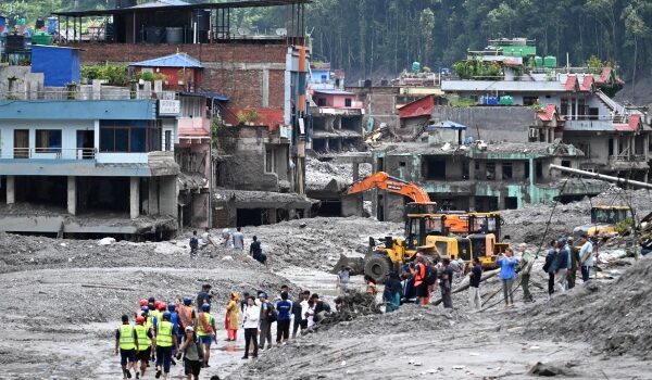 Nepal rescue teams recover flood victims as the death toll from devastating floods surpasses 1,000.