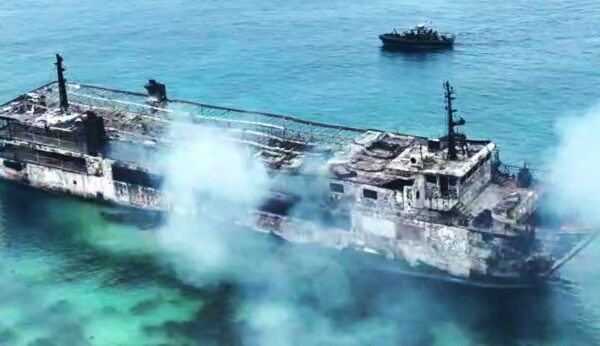Damaged ferry after a fire off Palawan in the Philippines as rescue teams search for 87 missing passengers and crew.
